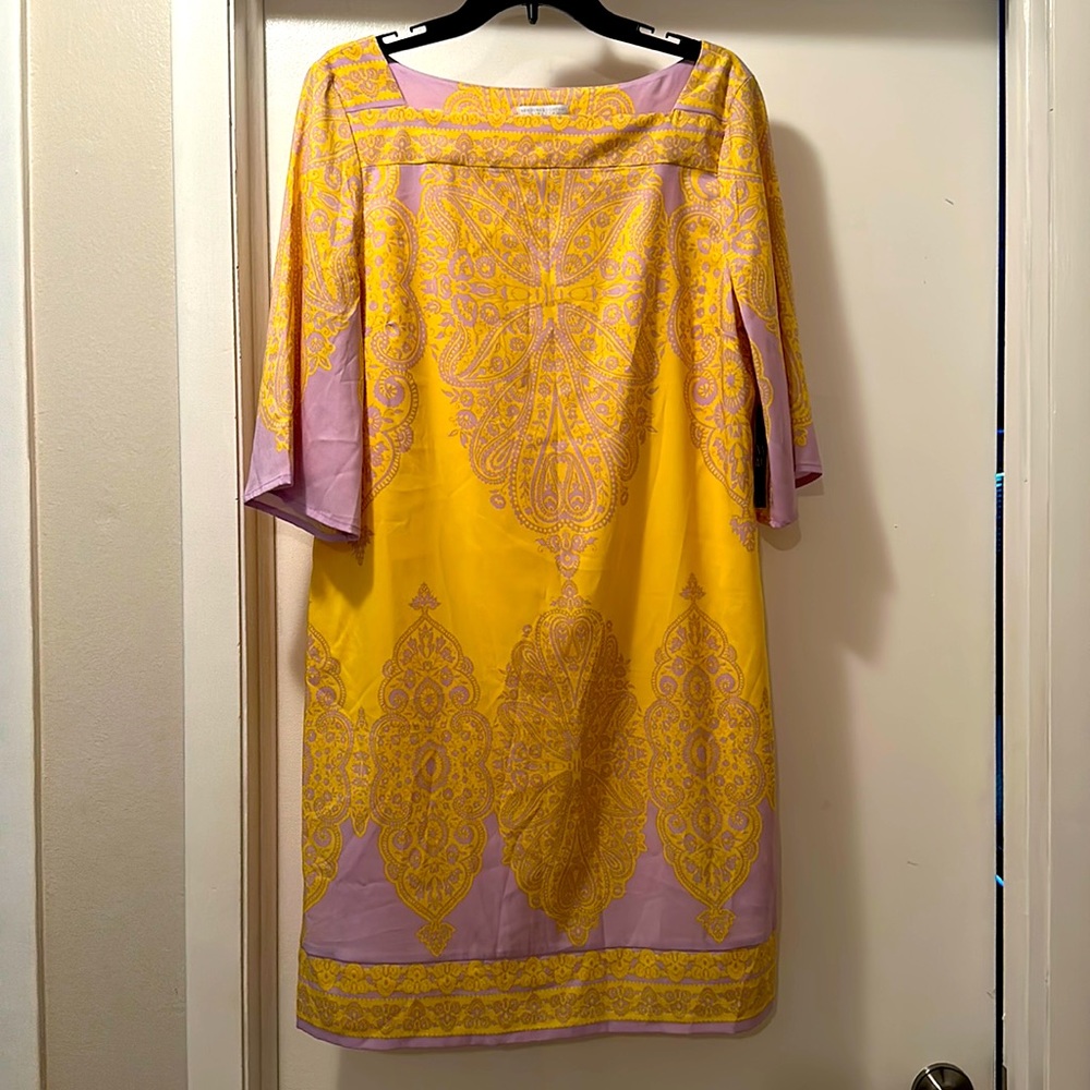 Beautiful silk like dress in yellow and lavender color , mid length sleeves.